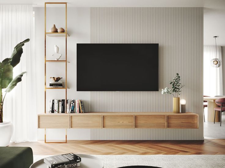 a living room with white walls and wooden furniture