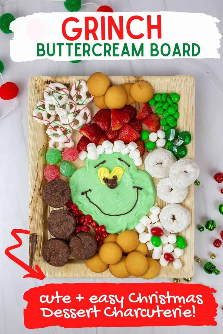 the grinch buttercream board is made with cookies and candy