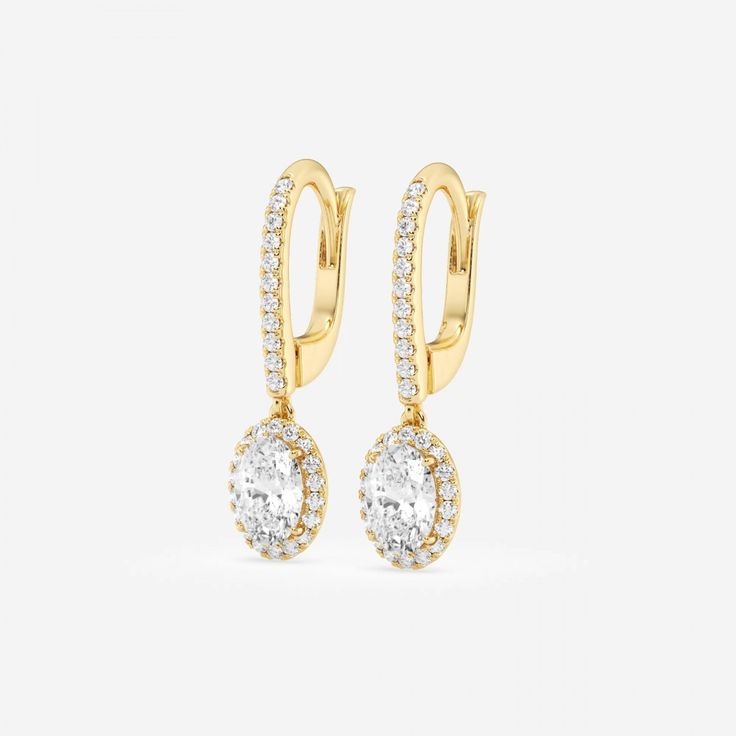 Set an image of sophistication with these stylish oval shaped lab grown diamond drop earrings. With a delicate halo of round diamonds surrounding it, and a diamond encrusted lever back, these earrings delicately dangle from the ears. Diamond Dangle Earrings, Diamond Drop Earrings, Diamond Drops, Pear Shaped Diamond, Perfect Engagement Ring, Gold Drop Earrings, Diamond Halo, Conflict Free Diamonds, Cute Jewelry