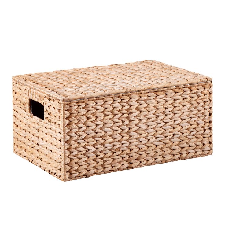 an empty wicker storage box on a white background