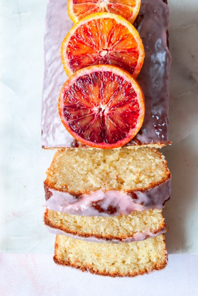 slices of blood orange pound cake with icing and grapefruit glaze on top