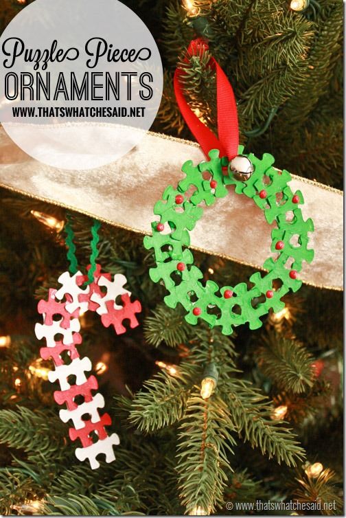 two christmas ornaments hanging from a tree with the words ornament's on it