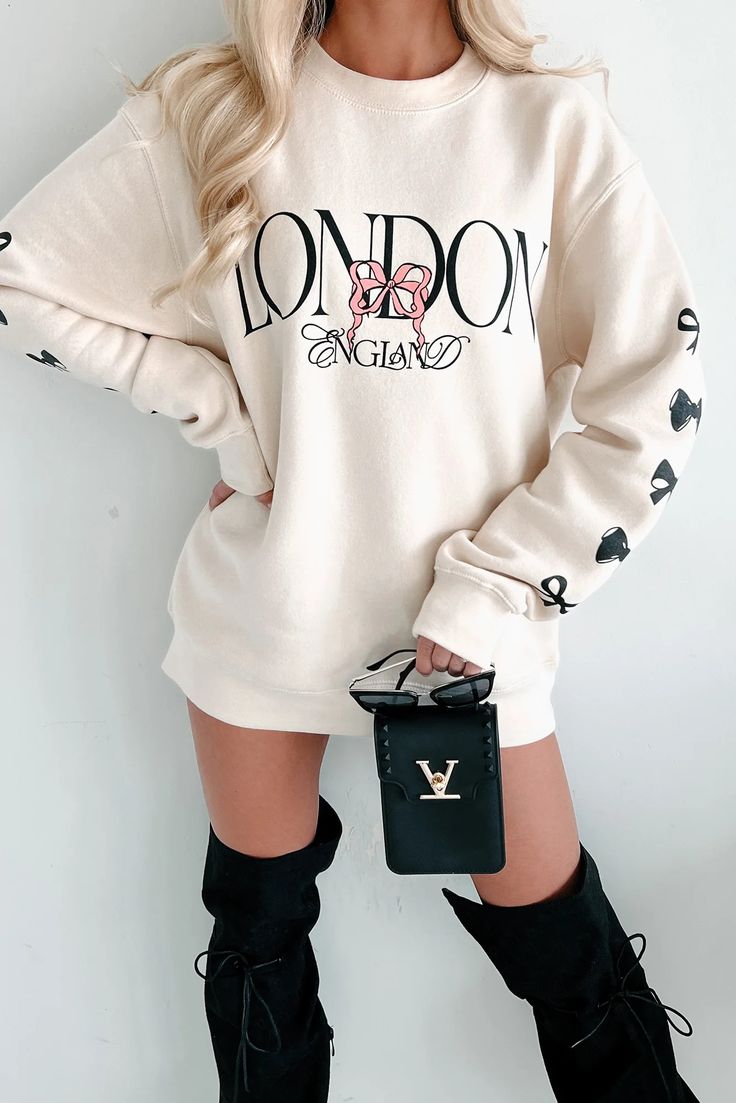 The London Life Graphic Sweatshirt (Ivory) · NanaMacs Cream Letter Print Top For Streetwear, Off White Long Sleeve Tops For Loungewear, Oversized Beige Letter Print Sweater, Oversized Beige Sweater With Letter Print, Cream Crew Neck Top For Day Out, Cream Long Sleeve Sweatshirt With Letter Print, Cream Long Sleeve Letter Print Sweatshirt, Cream Letter Print Sweater For Winter, Winter Cream Sweater With Letter Print