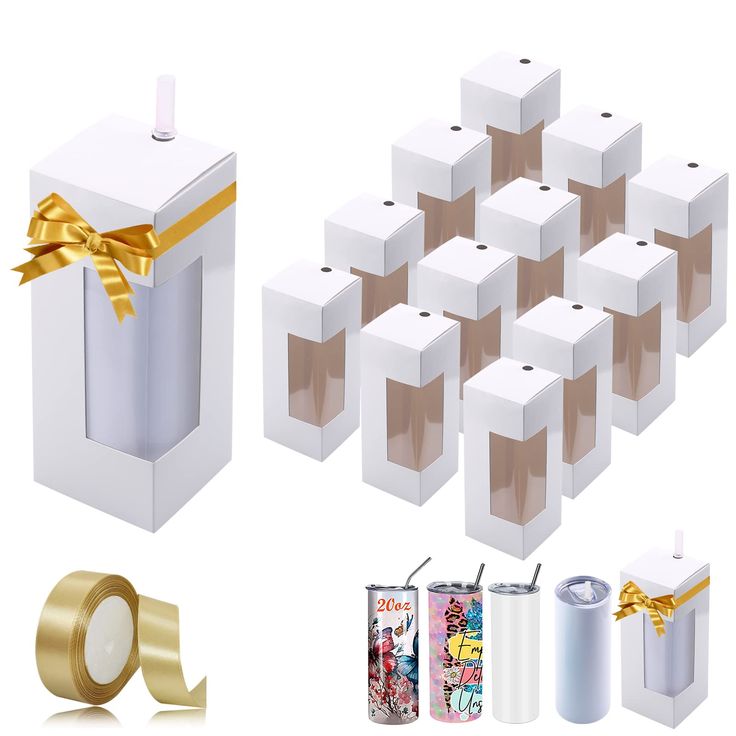 several white boxes with gold ribbons and two rolls of toilet paper