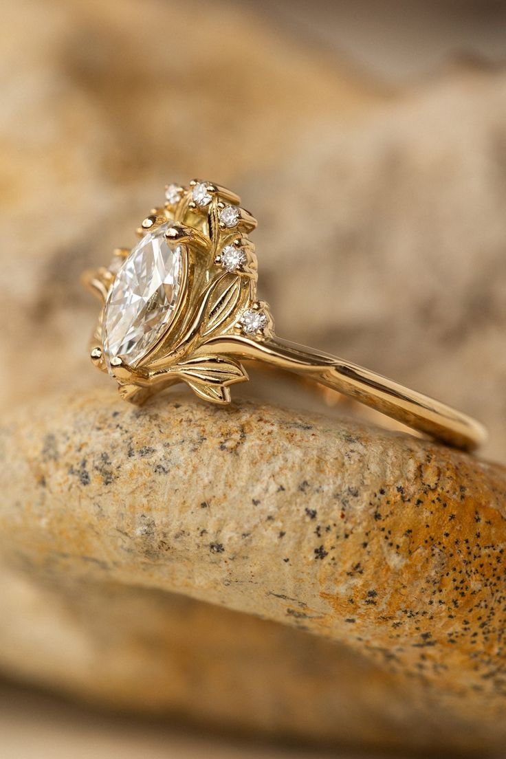 a close up of a ring on a rock