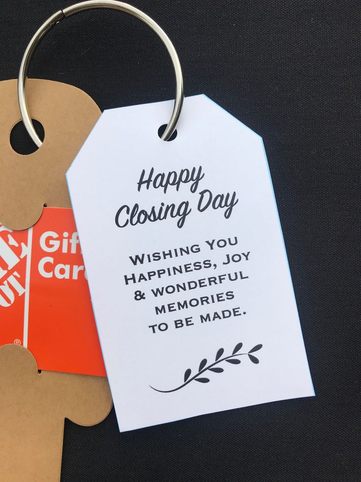 a gift card with the words happy closing day on it next to a pair of scissors