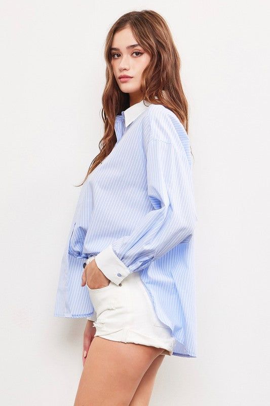 Feel on top of the world in our Cloud 9 Striped Collar Top! This professional top features pinstripes and a chic button-up design. With a stylish contrast collar, you'll stand out from the crowd while still looking polished. Perfect for adding a touch of playfulness to your work wardrobe. Spring Long Sleeve Blouse With Striped Collar, Spring Blouse With Striped Collar And Long Sleeves, Striped Collared Blouse For Spring, Fall Daywear Shirt With Striped Collar, Fall Season Striped Collar Shirt For Daywear, Fitted Top With Striped Collar For Business Casual, Trendy Tops With Contrast Stripes For Work, Spring Tops With Vertical Stripes And Shirttail Hem, Spring Office Wear Blouse With Placket