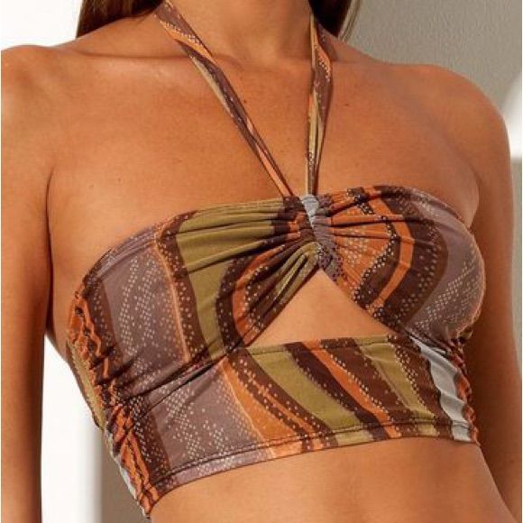 Brand New With Tags Size Small Halter Neck That Ties In The Back Super Stretchy Material Need Room In My Closet, Make An Offer & Check Out My Other Listings! Trendy Orange Crop Top For Fall, Trendy Brown Tops For Festival, Trendy Brown Top For Festival, Casual Halter Top For Spring Music Festival, Fitted Orange Tops For Festival, Casual Brown Crop Top For Party, Brown Halter Top For Summer Party, Casual Orange Halter Top For Spring, Casual Orange Halter Top For Beach