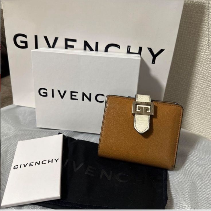 Givenchy Compact Wallet Euc. Full Inclusion (Come With Box , Dustbag, Gift Bag) Wallet Interior Is Clean With Some Wear As Shown In Photo Exterior Is Clean Minor Wear On Edges Coin Compartment Has Minor Residue Clean Bills Compartment Givenchy Bags, Givenchy Bag, Compact Wallet, Gift Bag, Givenchy, Wallets, Dust Bag, Coin, Exterior