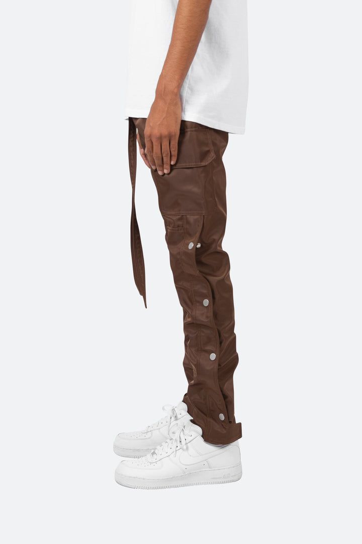 the Snap Zipper II Cargo Pants are designed with an updated relaxed fit throughout, improved, stiffer fabric, with cargo pockets at the side seam, 4 snap closures at the outseam with a zipper underneath the entire length, velcro closure at the leg opening and finished with a built in belt made of self material. details Snap Pants, Pants Outfit Men, Mens Jogger Pants, Black Men Street Fashion, Men Street Fashion, Fuzzy Cardigan, Mens Joggers, Grey Hoodie, Pants Outfit