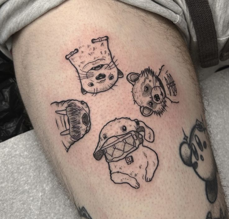 tattoos on the leg of a man with various items drawn on it's legs