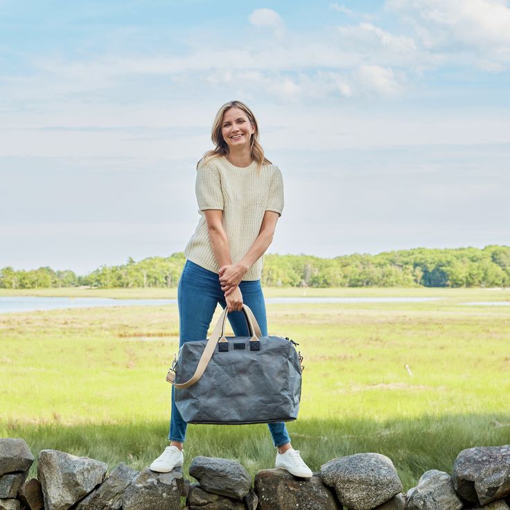 The essential weekender that will have every hotel guest admiring your bag. A unique, luxurious looking weekend tote with ample interior space capable of carrying you through a short getaway. Lightweight with versatile carrying options this bag is also water resistant and sustainably made from our TEC paper. Versatile Weekender Bag With Large Capacity, Versatile Weekender Bag With Large Capacity For Weekend Trips, Versatile Large Capacity Weekender Bag For Trips, Versatile Travel Tote Bag With Leather Handles, Versatile Rectangular Weekender Bag With Top Handle, Canvas Shoulder Bag For Weekend Trips, Duffle Bag With Removable Pouch For Weekend Trips, Duffle Bag With Top Carry Handle For Weekend Trips, Weekend Duffle Bag With Removable Pouch And Double Handle