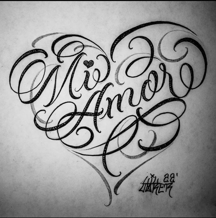 a heart with the word love written in cursive writing on top of it