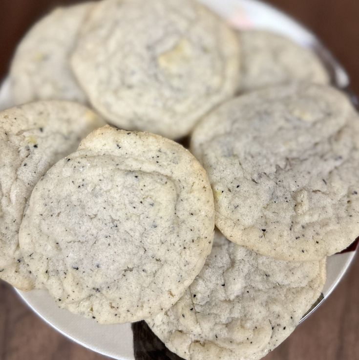 some cookies are sitting on a white plate