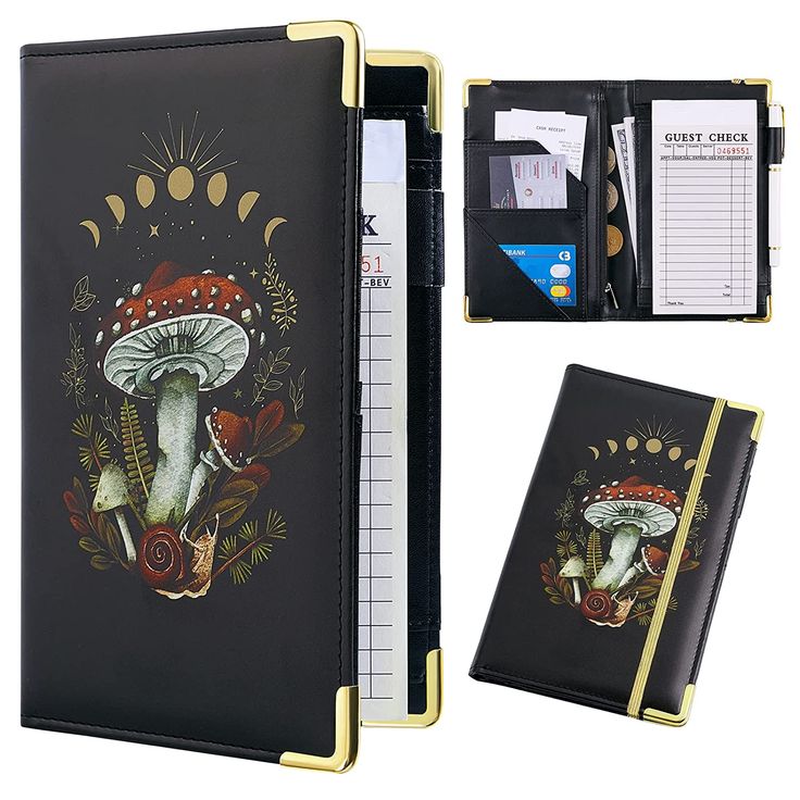 a wallet with an image of mushrooms on it and a notepad next to it