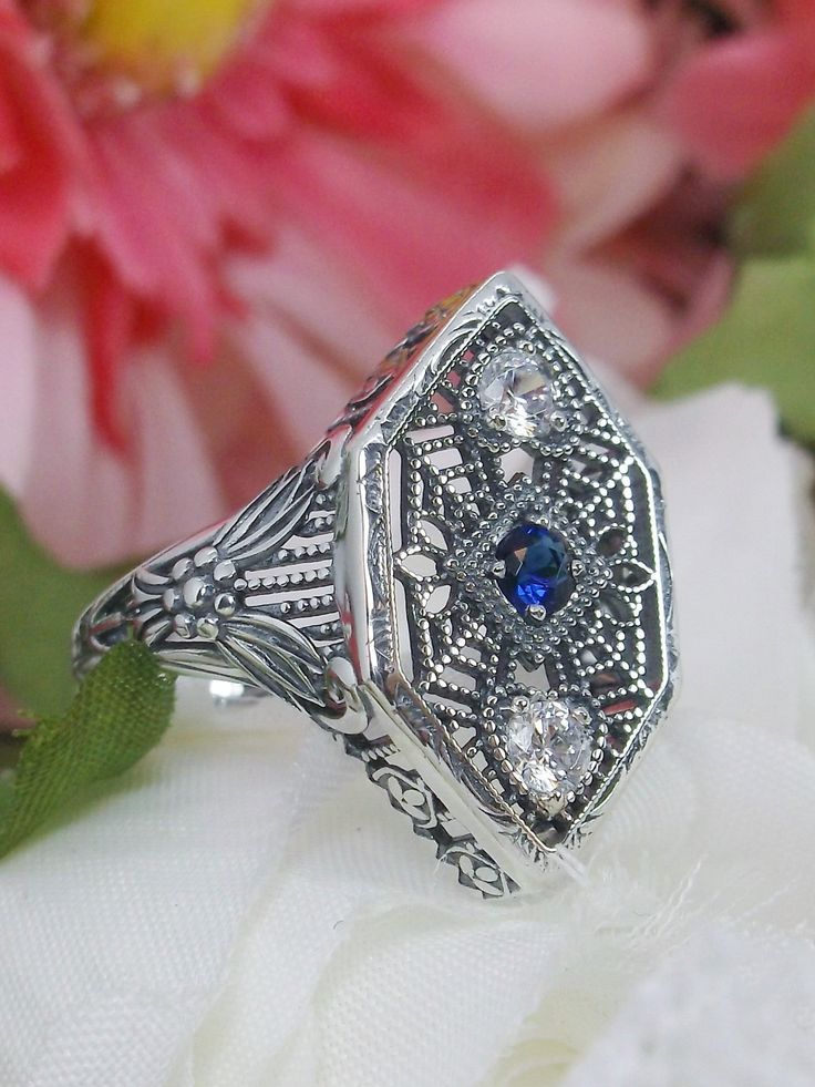 Blue Sapphire Ring, Sterling Silver Filigree, Charlotte design, vintage jewelry, Silver Embrace Jewelry, D231 Silver Sapphire Ring With Intricate Design, Sterling Silver Sapphire Ring With Filigree, Ornate Sterling Silver Filigree Ring With Intricate Design, Antique Silver Sapphire Ring With Diamond Accents, Silver Sapphire Filigree Jewelry, Silver Sapphire Jewelry With Filigree, Sterling Silver Sapphire Ring For Wedding With Intricate Design, Victorian Sapphire Ring With Diamond In Silver, Victorian Style Sapphire Ring With Diamond Accent