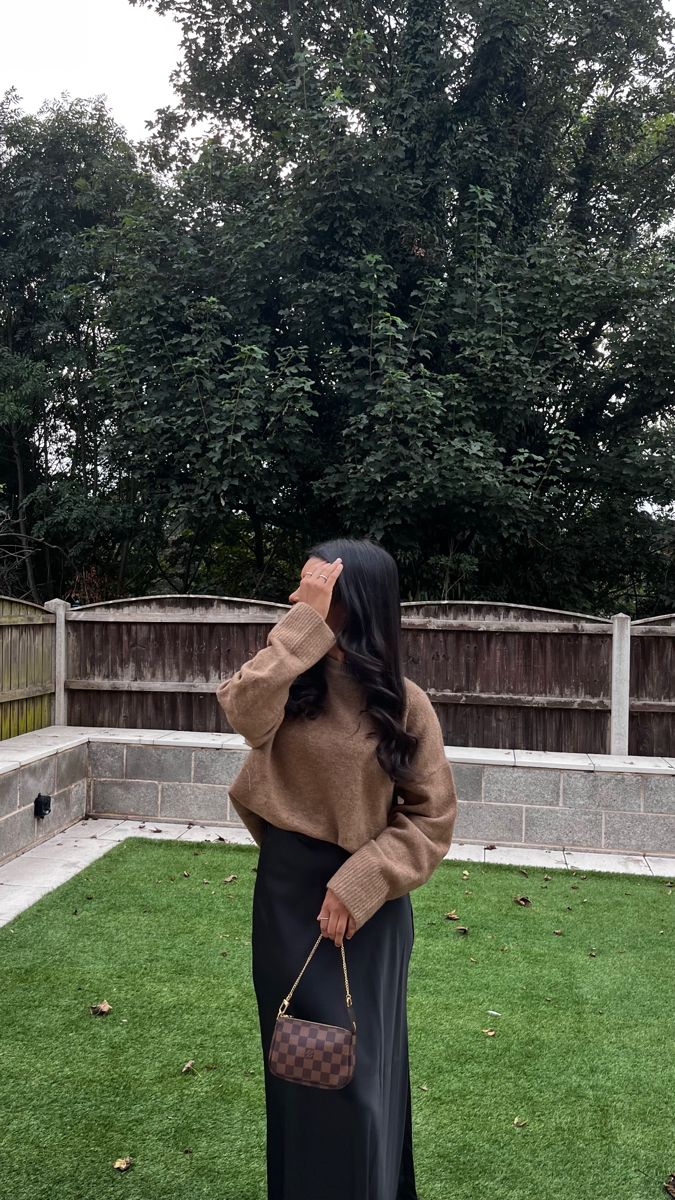 Silk Dress Jumper Outfit, Brown Midi Dress Outfit Fall, Long Brown Skirt Outfit Fall, Holiday Church Outfits For Women, Midi Skirt Jumper Outfit, Long Black Silk Skirt Outfit Winter, Thanksgiving Outfit Modest, Long Skirt Christmas Outfits, Long Skirt And Jumper