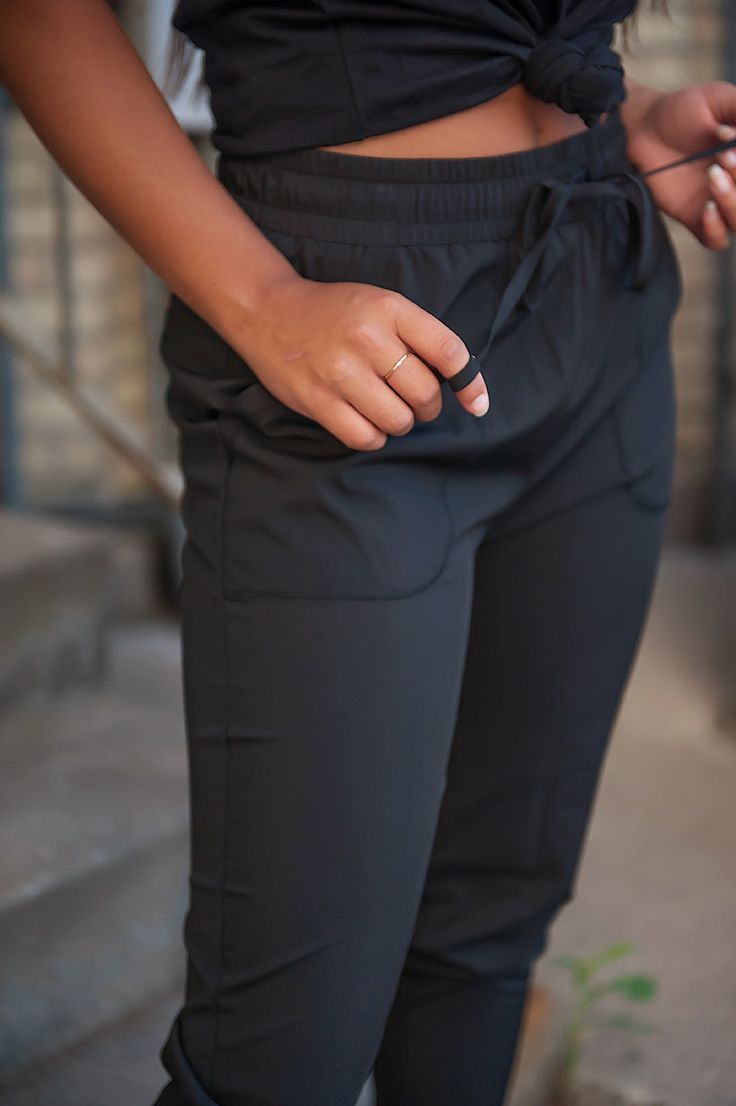 Comfy, casual, and lightweight joggers with functional drawstring waist, front and back pockets, slightly cropped and slim cut legs. Perfect to wear around the house, to practice, the gym, or anywhere else! Fabric: 93% Polyester, 7% Spandex / Fabric is thin and lightweight for breathability, but extremely durable and not see through. Doesn't shrink, or show wear after repeated washing and wearing. Size guide:XXS - Women's size 00 or girl's size 12 - inseam 24 inchesXS - Women's size 2 or girl's Most Comfortable Bra, Comfortable Bras, Black Joggers, Mens Activewear, Womens Activewear, Ladies Tops Fashion, Comfy Casual, The Gym, Coats Jackets Women