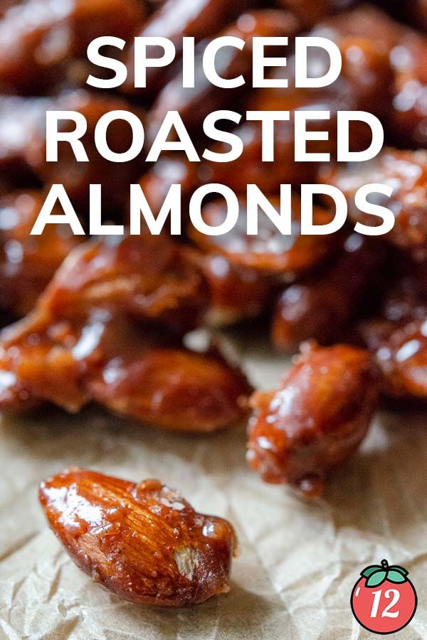 roasted almonds with text overlay that reads spiced roasted almonds