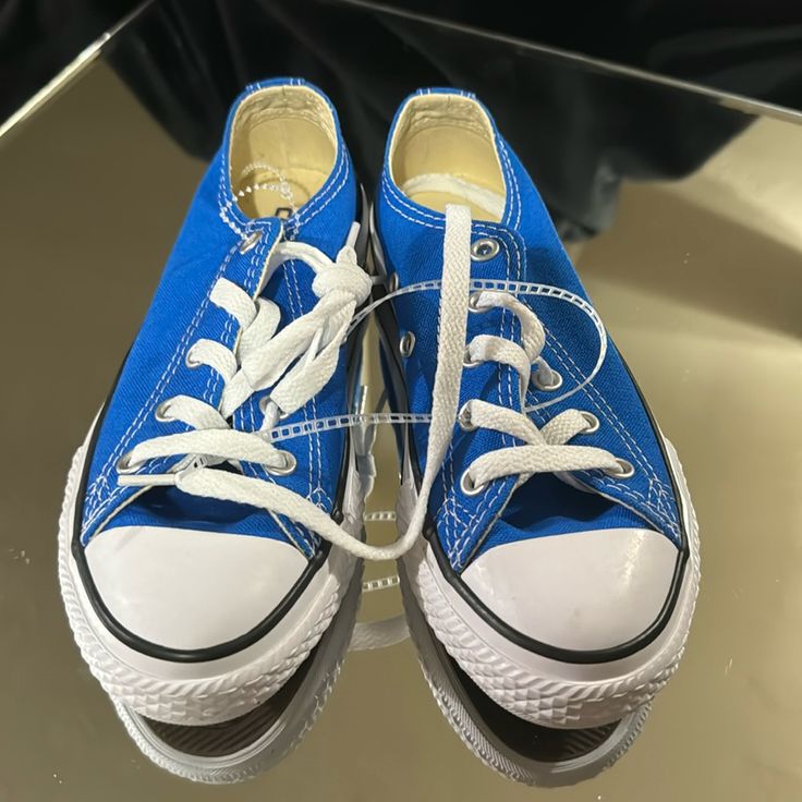 Nwot Kids Converse Blue Unisex Tennis Shoes Blue Canvas Shoes With Round Toe For Streetwear, Blue Round Toe Canvas Shoes For Streetwear, Blue Low-top Canvas Shoes For Streetwear, Blue Canvas Shoes With Rubber Sole, Closed Toe, Casual Blue Canvas Shoes With Closed Toe, Blue Lace-up Canvas Shoes With Rubber Sole, Blue Lace-up Canvas Shoes, Blue High-top Canvas Shoes With Rubber Sole, Sporty Blue Lace-up Canvas Shoes