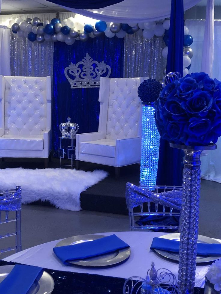 a blue and white themed party with chairs