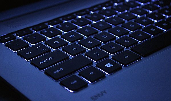 a close up view of the keys on a laptop computer's backlit keyboard