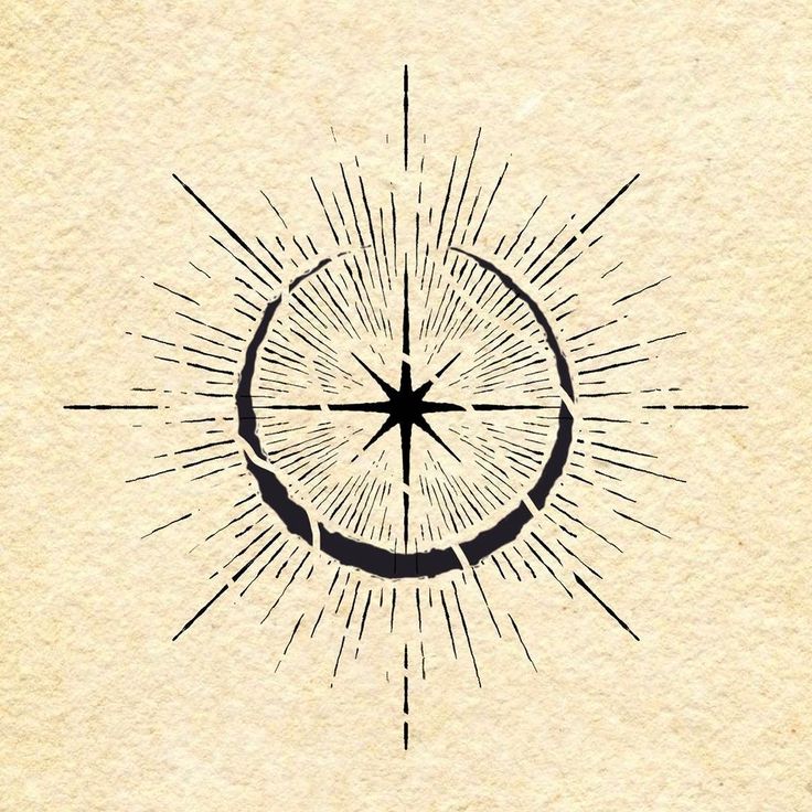 a drawing of a compass with rays coming out of it