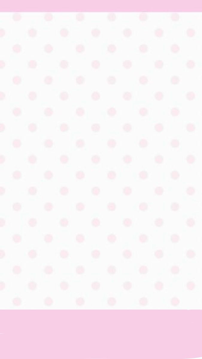 a pink and white background with polka dots