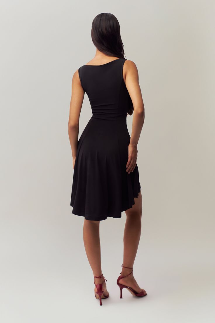 Introducing the Daye Mini Dress, inspired by our best-selling Daye Midi Dress. This chic mini option boasts the same elegant shape, but in a flirtatious shorter cut. Crafted from stretch jersey material and lined with power mesh for a flawless look, with a playful hi-lo flutter hem for added fun. Perfect for a full day and night of endless fun. Fabrication: Matte Jersey; 92% Polyester, 8% Spandex Sonali is wearing a size S and is 5'10" with a 31" bust, 35" hips, and 23" waist Short Cuts, Mini Black Dress, Midi Dress, Mesh, Spandex, Mini Dress, Fabric, How To Wear, Black