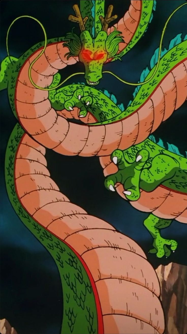 two green and orange dragon sitting on top of each other