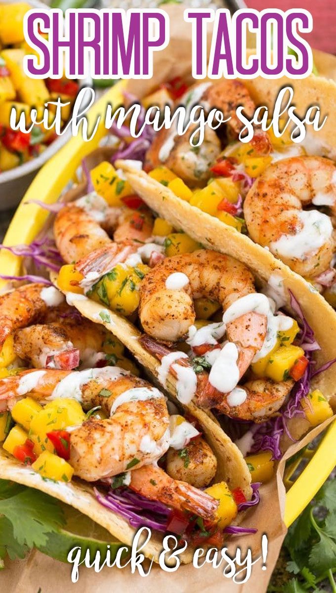 shrimp tacos with mango salsa and pineapple slaw on a yellow platter