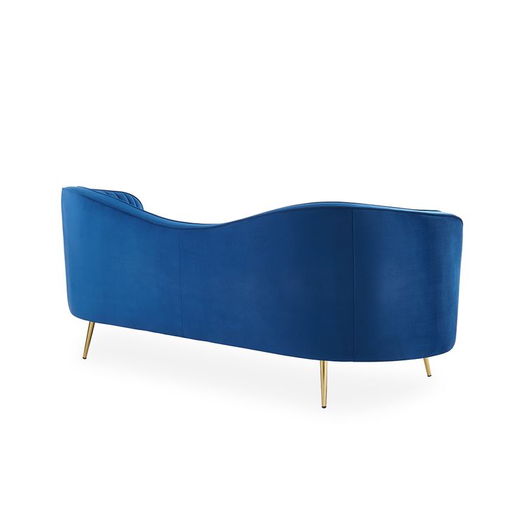 a blue couch sitting on top of a white floor