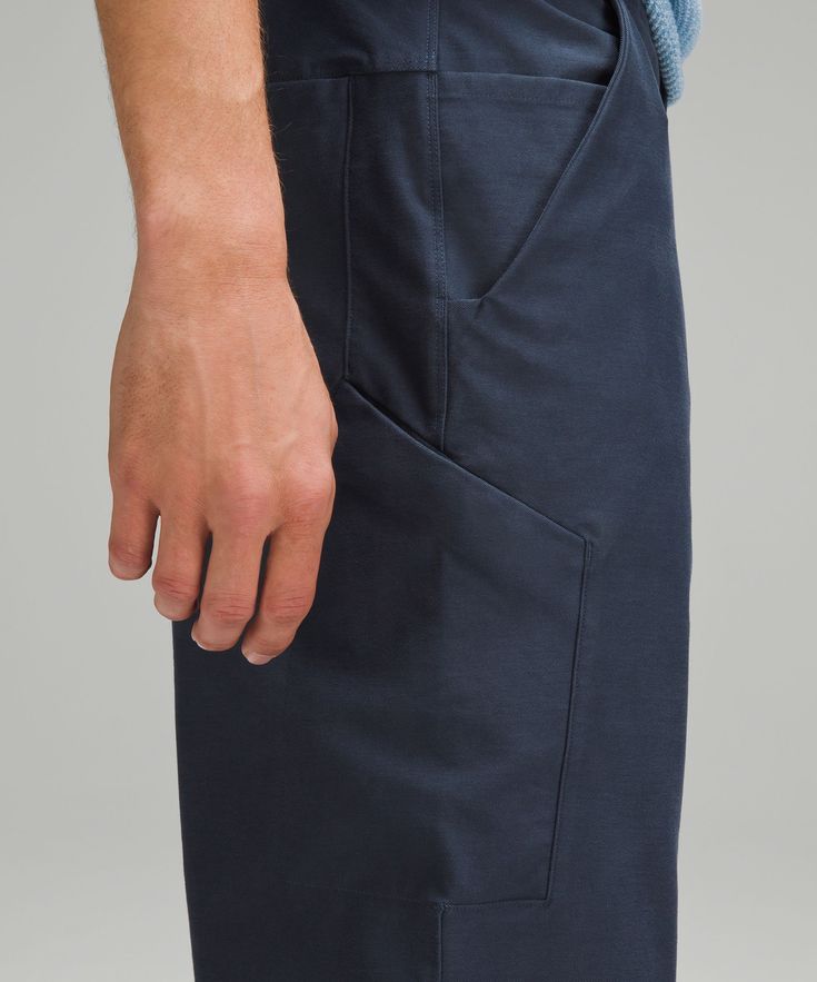 Prioritize comfort. Four-way stretch fabric and a ventilated gusset make these carpenter pants a hardworking go-to. Designed for Casual. Roomy fit through glutes and thighs:Intended to sit at ankle for 32"-34" inseam. Hand pockets with hidden phone sleeve. Thigh pocket and back pockets with secure snap closures. Fly front with internal drawcord. Darts for added knee articulation. Ventilated gusset for mobility and thermal comfort. Jumper Short, Thermal Comfort, Michelle Yeoh, Loungewear Women, Carpenter Pants, Pants Straight Leg, Pants Straight, Work Casual, Long Tops