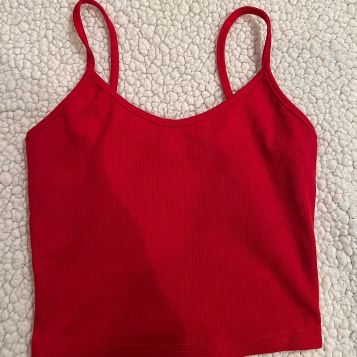 Red Shein Tank Top. Size Xs. Never Worn. Super Cute And Comfy. Red Stretch V-neck Tank Top, Trendy Red Seamless Tank Top, Red Seamless Cami Top, Red Stretch Cami Top, Trendy Red V-neck Tank Top, Fitted Red Tank Top For Spring, Red Seamless V-neck Top, Red Seamless Tank Top For Spring, Red Stretch Seamless Tank Top