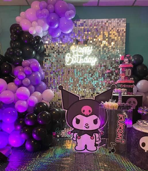 a birthday party with balloons and decorations