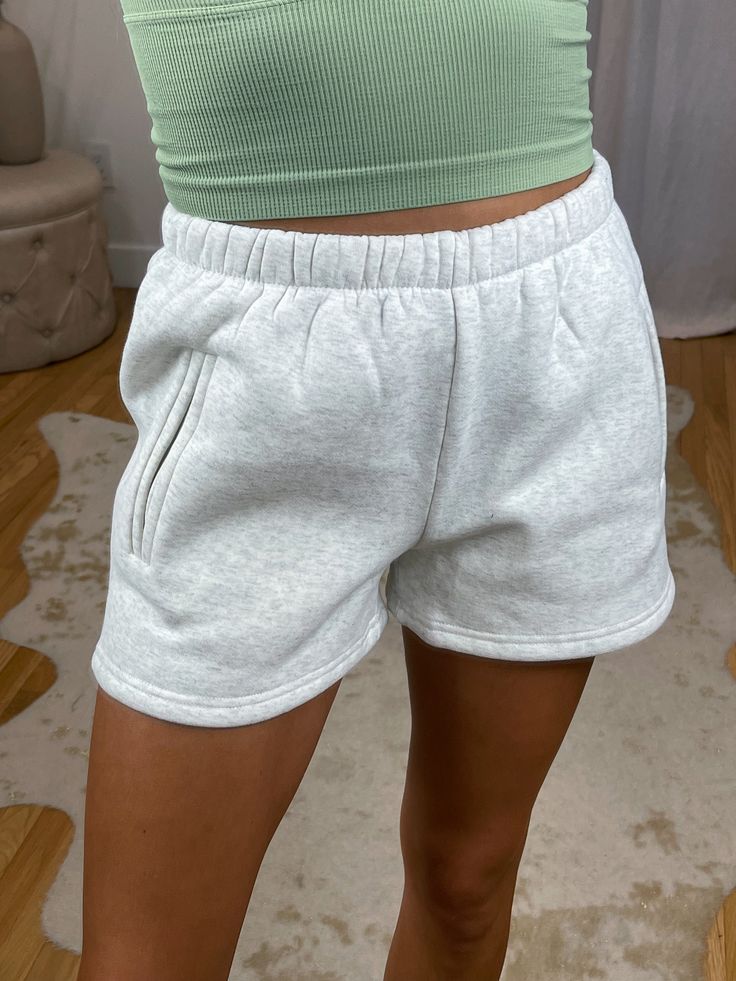 The perfect Comfy Fleece Lined Sweat Shorts ft. Stretchy Elastic Waist & pockets. True to size & stretchy. Size up for a looser/baggier fit! BEST SELLERS! Maclaine is 5'7 wearing a size small 50% Polyester 50% Cotton Available in Sage Green, Black, Purple, Dark Brown, Heather Grey, Grey, Charcoal, Green, Bubblegum, Light Lavender, Blood Orange Red, Baby Blue, Taupe & Camel MEASUREMENTS: Small 12.5” top to bottom. 12” waist(size 24 laying flat, but has stretchy elastic waist) 3” inseam Medium 13” Chloe Outfit, Red Preppy, Summer Bottoms, Champion Shorts, 2024 Style, Sweatpants Shorts, Fire Fits, Sleep Shorts, Pine Green