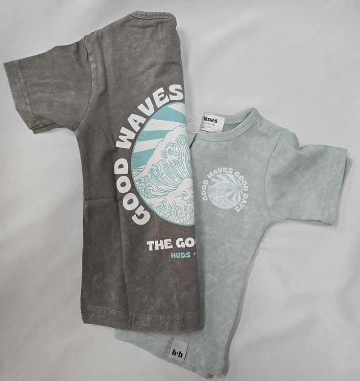 Ride the wave of comfort and style with our Good Waves Good Days Acid Wash Tee. Made with an organic cotton and spandex blend, this tee will have you feeling good and looking good. And with a fun graphic, you'll spread good vibes wherever you go! Available in Stone Grey or Green - or check out the "misprint" in brown we're offering at a discounted rate - see "Oops." Machine wash with like colors in cold water and tumble dry on low or hang dry. *Acid wash effect varies for each shirt. Unisex Acid Wash T-shirt For Summer, Sporty Acid Wash Soft-washed T-shirt, Acid Wash Graphic Cotton T-shirt, Retro Acid Wash Soft-washed T-shirt, Acid Wash Cotton T-shirt, Fall Must Haves, Nursery Gift, Family Set, Sweatshirt Set