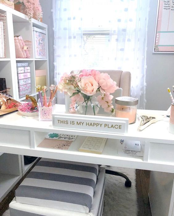 this is my happy place sign sitting on a desk with flowers and other items around it