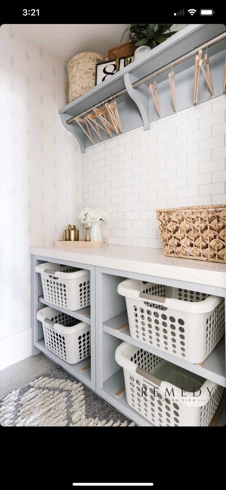 the laundry room is clean and ready to be used as a storage area for clothes