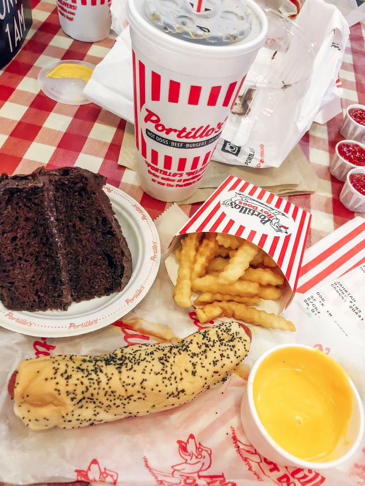 a table topped with lots of food and drinks