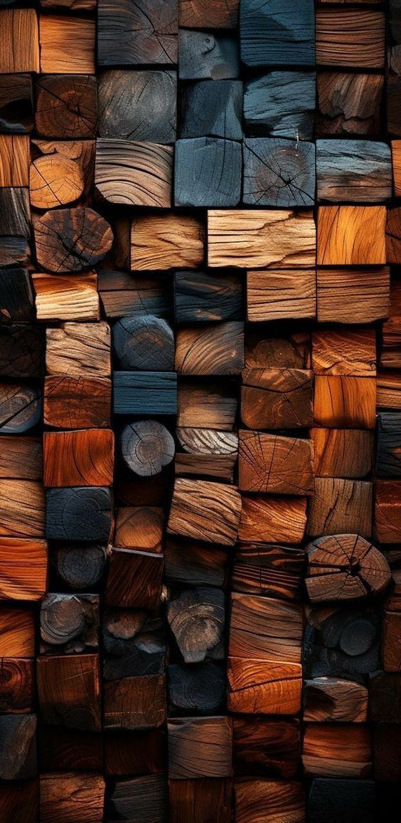 many different types of wood are stacked up on top of each other in this photo