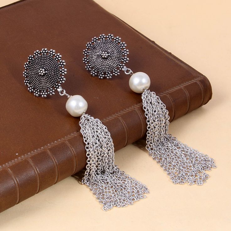 Overview These stylish Earrings set from JewelryTrack will certainly leave you spellbound. These Earrings set have an excellent finish and gives out an exquisite sense of style. If you are looking for an amazing Fashion Jewelry set for special occasions such as Anniversary, Engagement, Party, Wedding or for gifting , then your search ends here.  Item Description Item: Oxidized Silver Plated Handmade Jhumki Earrings COLOR : Silver Lenght: 12 cm OCCASION: PARTY WEAR , WEDDING, MARRIAGES, CASUAL, DAILY WEAR Ideal For Gifting Please contact us for Bulk Orders. Seller Info: We are Aiming to supply best products to customers at best price. We believe good product nothing without good customer service. We always there for any query or help understanding something. Payment: We accept Payment Only Oxidised Jewelry, Jewellery Business, Antique Silver Jewelry, Fancy Jewellery Designs, Jhumki Earrings, Beads Jewellery, Hand Bracelet, Fashion Jewelry Sets, Fancy Jewellery