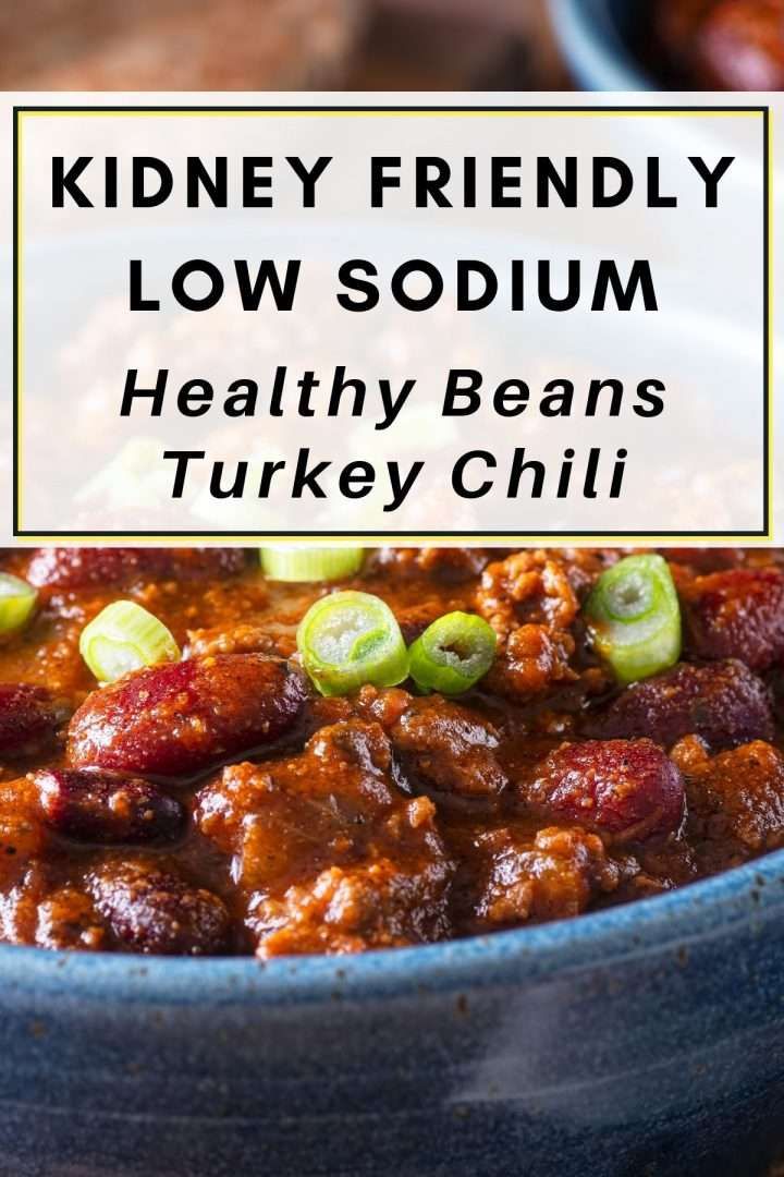 a blue bowl filled with chili and beans