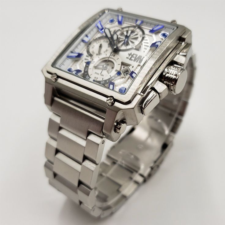 Luxury Silver Watches With Subdials, Stainless Steel Chronograph Watch With Rectangular Dial, Modern Silver Chronograph Watch With Rectangular Dial, Chronograph Watch With Rectangular Stainless Steel Dial, Silver Automatic Watch With Rectangular Dial, Modern White Gold Chronograph Watch, Luxury Silver Stainless Steel Chronograph Watch, Formal Stainless Steel Automatic Chronograph Watch, Modern White Gold Analog Chronograph Watch