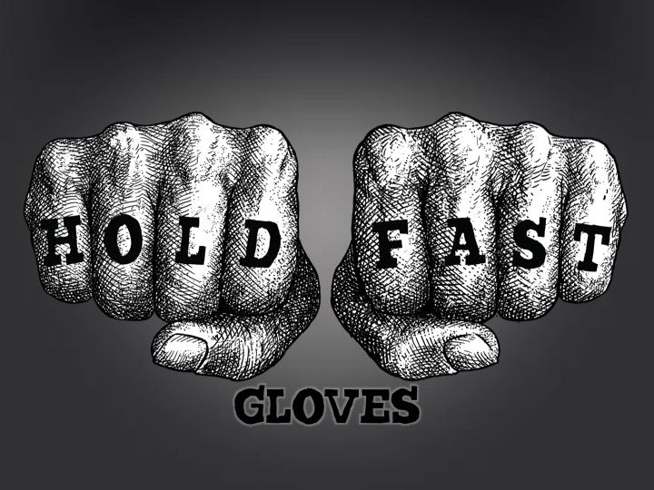 two fists with the words hold fast gloves written in black ink on a dark background