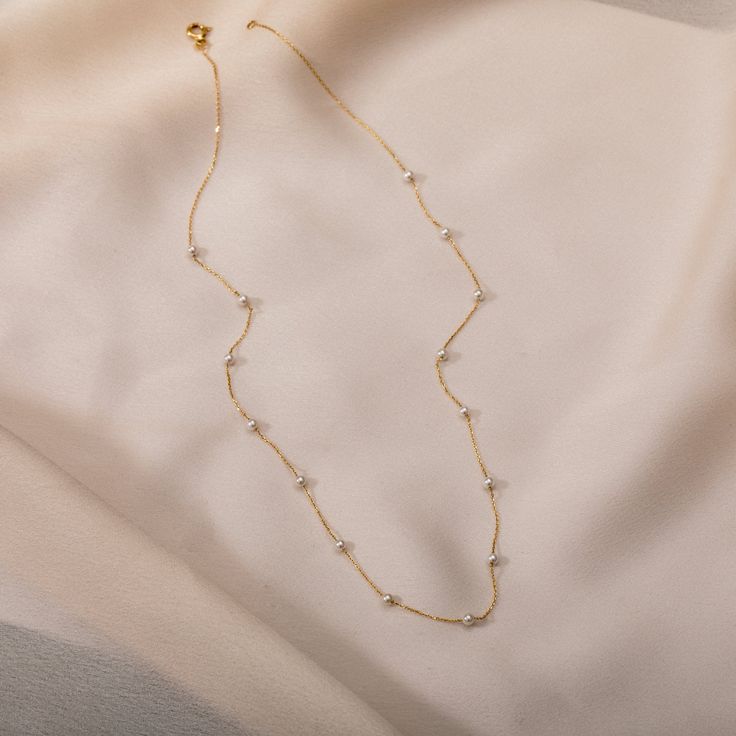 Multiple Pearls Necklace 14k Solid Gold, Dainty Every Day Fresh Water Pearls Necklace, Perfect Beach Jewelry, Gift For Bridesmaids ► Adding a customized tiny bar at clasp may be a good idea: https://etsy.me/3cn9OQ5 Material: Solid Gold (Not Gold Filled or Gold Plated) Karat: 14 K Gold (585) (Real Gold) The number of pearls may vary depending on the necklace's length. Chain thickness: About 0.72mm  M o r e * F r o m * U s  Goldstore Jewelry - https://etsy.me/3gHtcrZ * Editor's Pick - https://etsy Dainty Yellow Gold Station Necklace For Anniversary, Delicate Chain Necklace For Anniversary, Gold Station Necklace With Delicate Chain For Anniversary, Gold Diamond Station Necklace As Gift, Dainty Single Strand Diamond Necklace Gift, Gold Station Necklace For Anniversary, Dainty White Gold Station Necklace For Anniversary, Fine Jewelry Adjustable Chain Station Necklace For Anniversary, Dainty White Gold Station Necklace As Gift