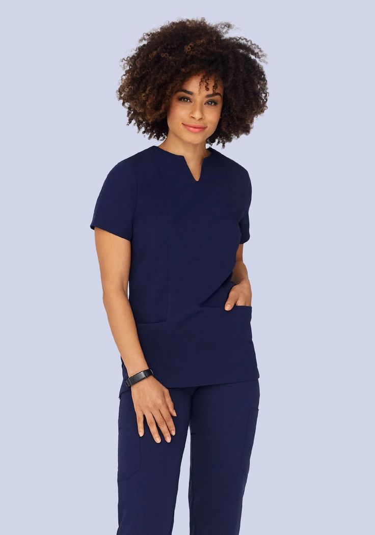 A versatile scrub top with 5 pockets and a notch neck. Nurse Fashion Scrubs, Vitamin Therapy, Notch Neck Top, Navy Scrubs, Fit Scrubs, Navy Blue Scrubs, Pocket Cargo Pants, Soft Yoga, Nursing Fashion