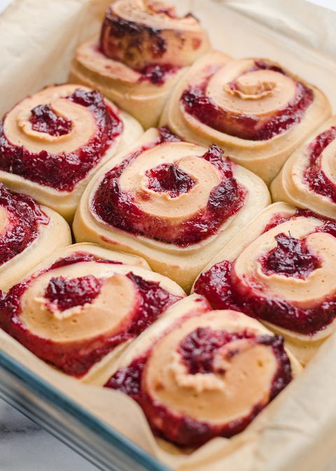 a pan filled with pastries sitting on top of a counter