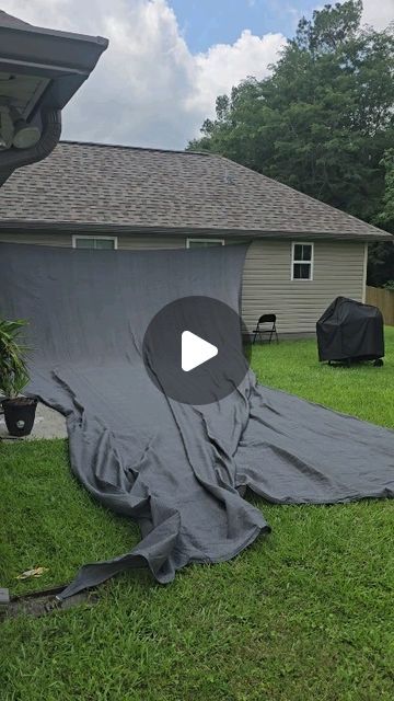 an image of a backyard with a tarp covering it