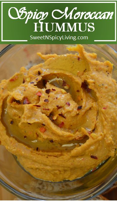 an image of hummus in a glass bowl